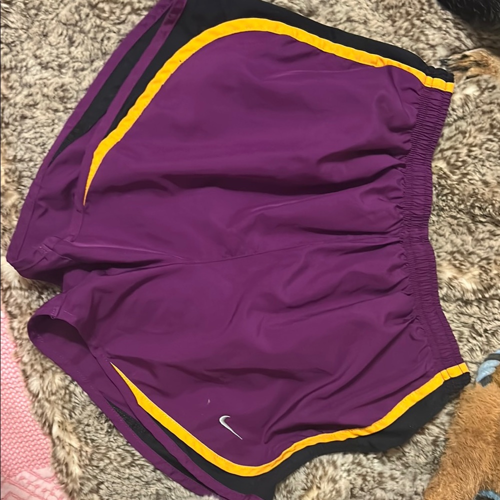 Nike Women's Purple Athletic Shorts with Yellow Trim